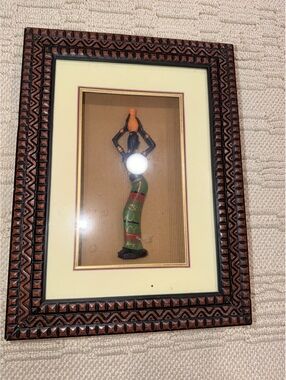 Framed woman silhouette wall art